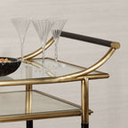 Mayfair 59 Bar Cart featuring an antique brass frame and elegant glassware for stylish entertaining.