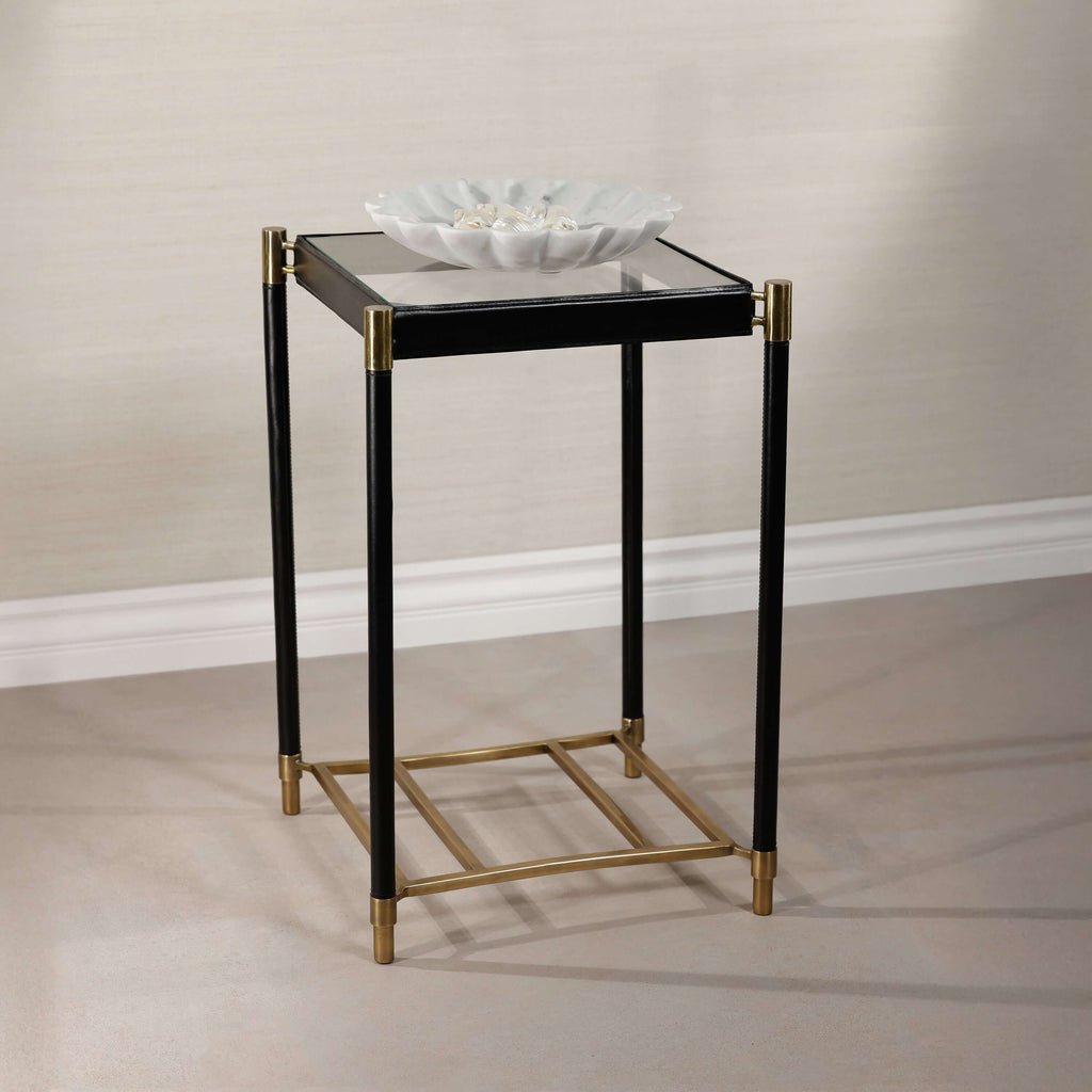 Park Lane 18 Leather Side Table with glass top, black leather legs, and brass accents, perfect for modern decor.