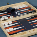 Monaco 19" Backgammon Set with dice and playing pieces on a stylish board, showcasing its elegant design.