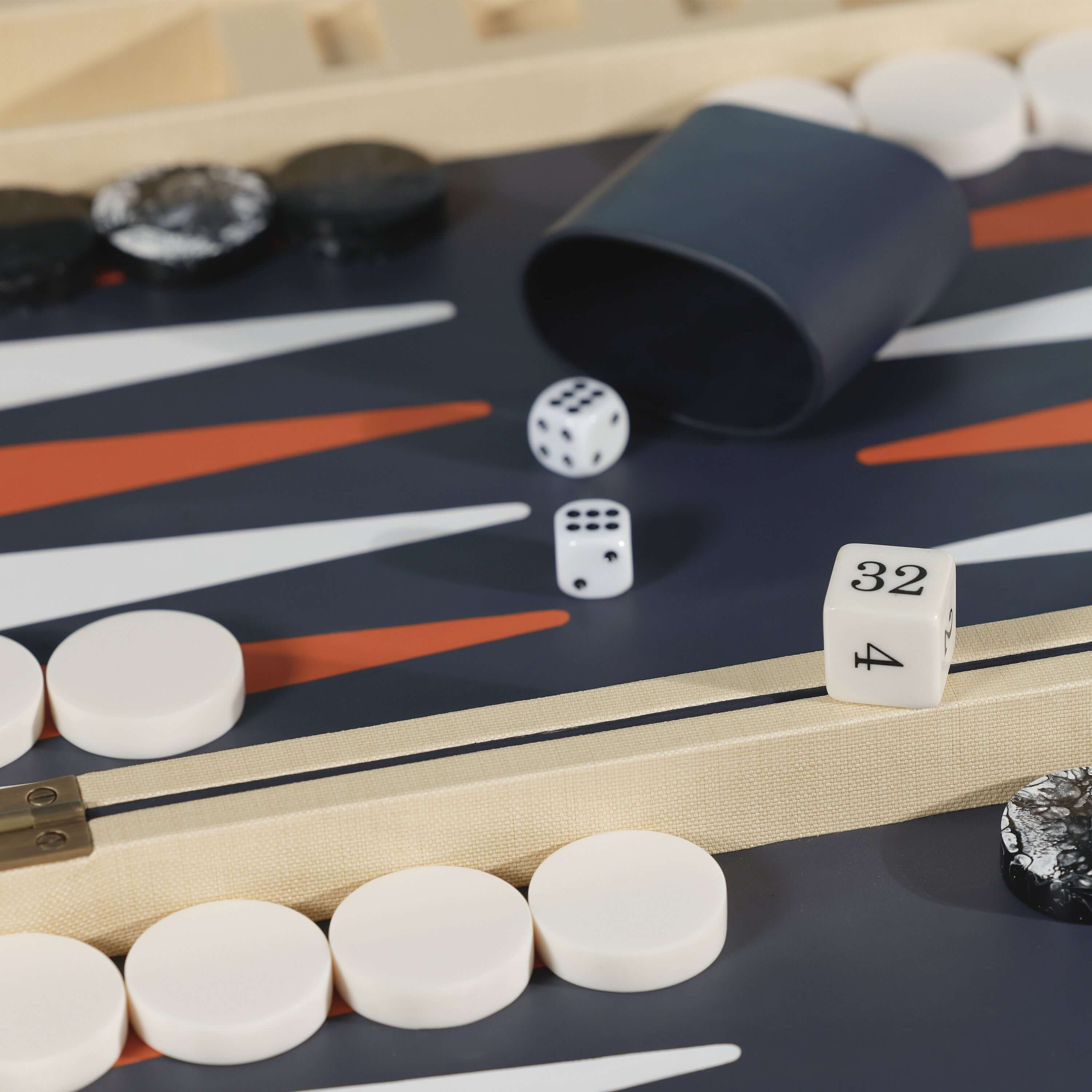 Monaco 19" Backgammon Set featuring a stylish playing field with dice and checkers in a luxurious design.