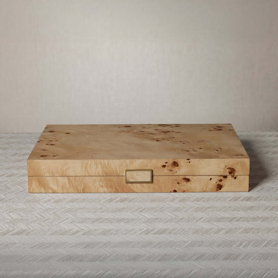 Marbella Backgammon Set in burl wood veneer showcasing warm honey and amber grain pattern.
