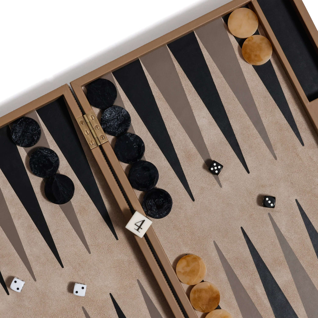 alt_tag: Geneva 19" Backgammon Set - Taupe Leather game board showing tan and black pieces with dice.