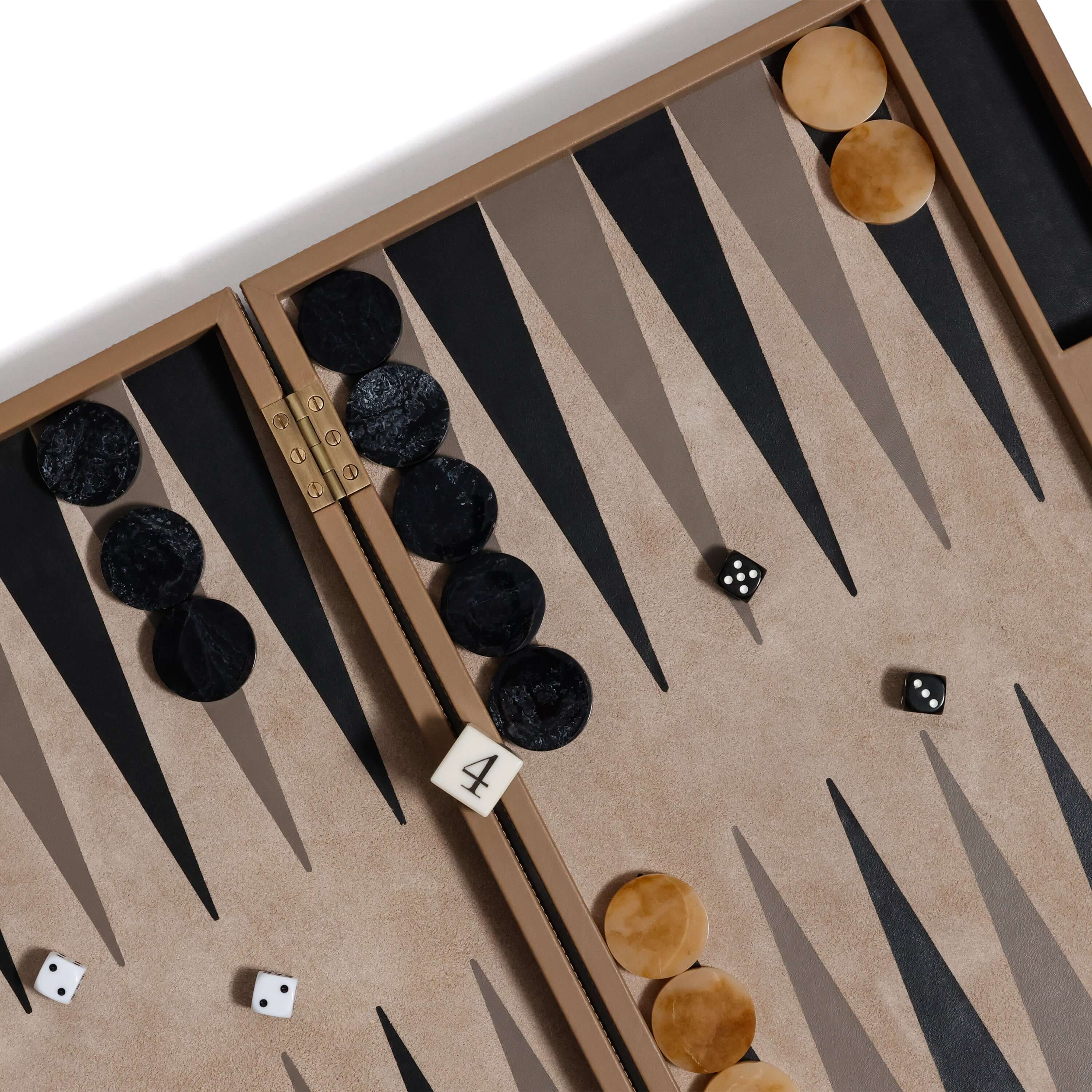 alt_tag: Geneva 19" Backgammon Set - Taupe Leather game board showing tan and black pieces with dice.