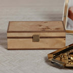 Linea Heritage Burl Veneer Jewelry Box with brass detailing and natural wood finish on soft surface.