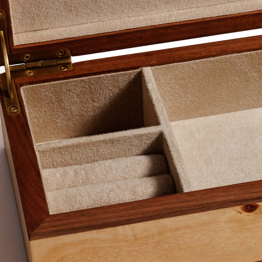 Interior view of Linea Heritage Burl Veneer Jewelry Box with soft suede lining and compartments for organization.