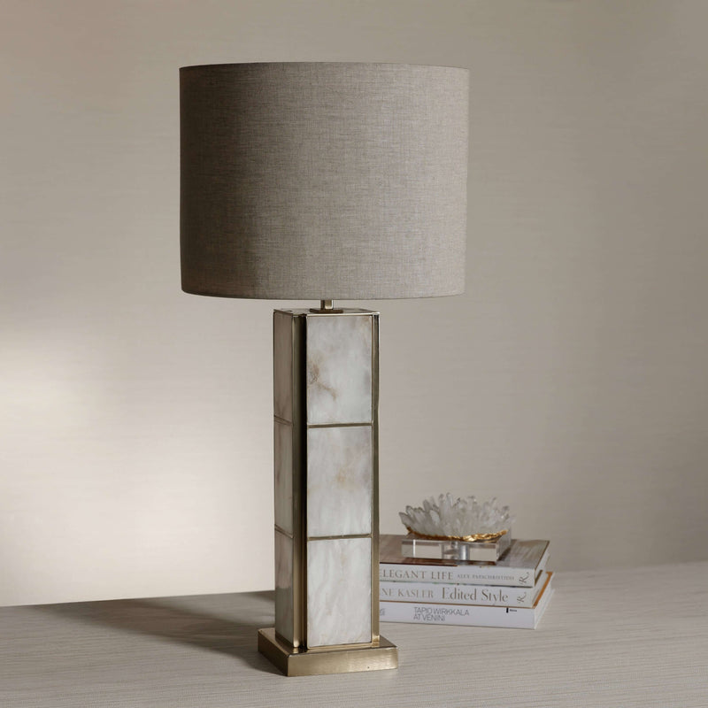 Golden Shore Alabaster Table Lamp featuring a unique alabaster base and a soft fabric shade, perfect for elegant interiors.