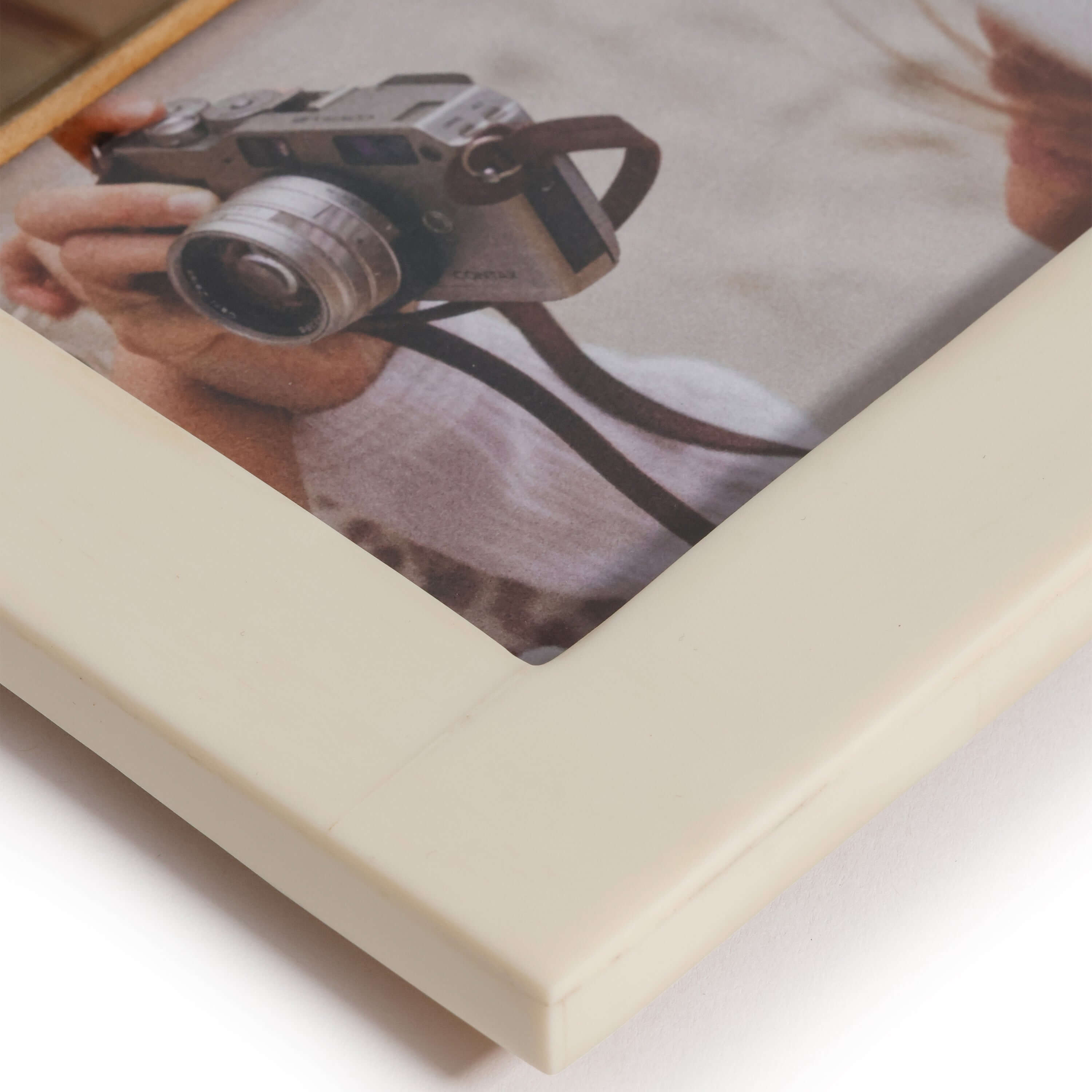 Close-up of the White Horn and Ivory Resin Photo Frame showcasing its smooth ivory finish.