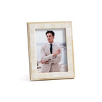Dune Natural and Bleached White Bone Photo Frame showcasing a man in a suit against a scenic backdrop.