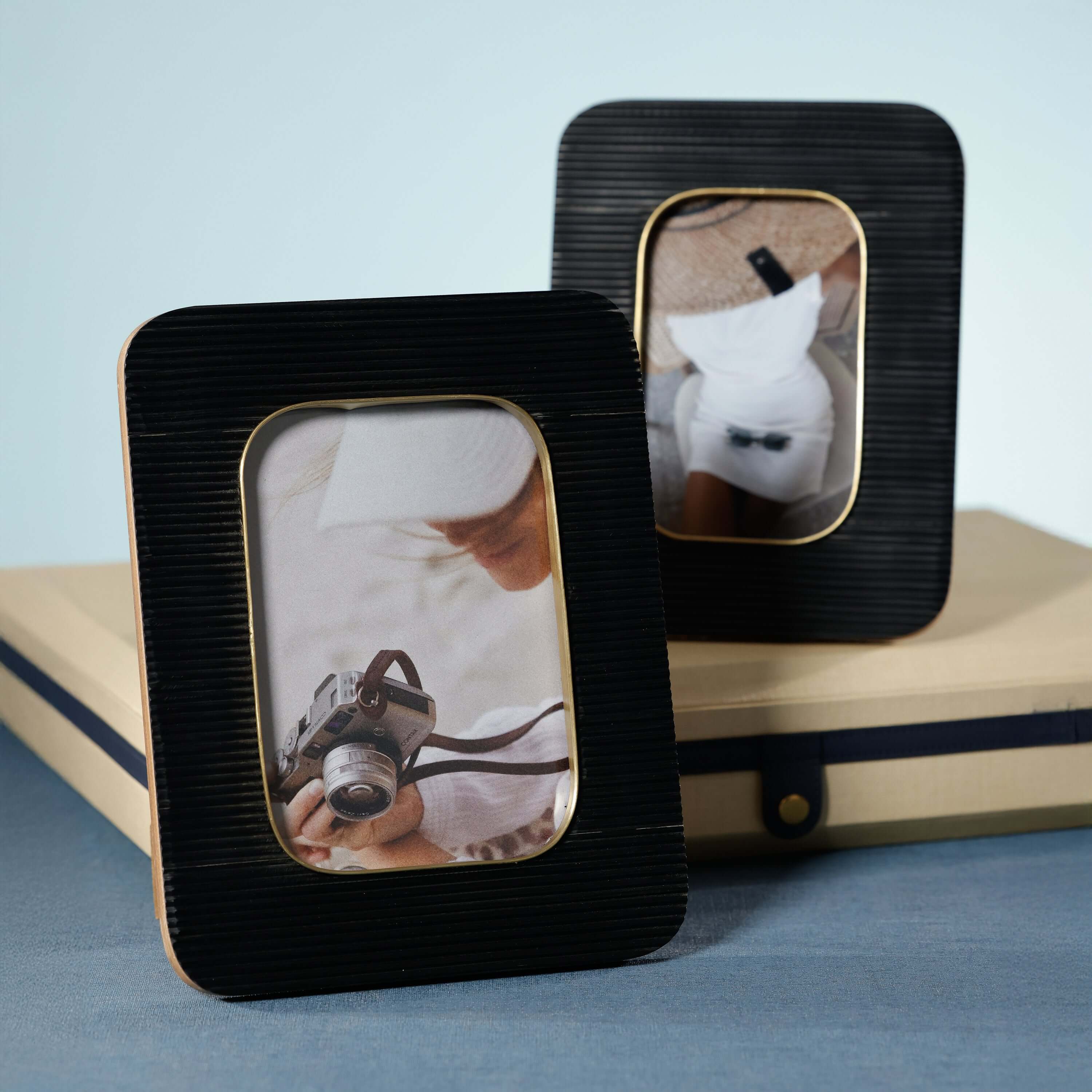 Black Resin Ribbed Photo Frame with Brass Accent showcasing modern elegance with ribbed texture and brass inner border.