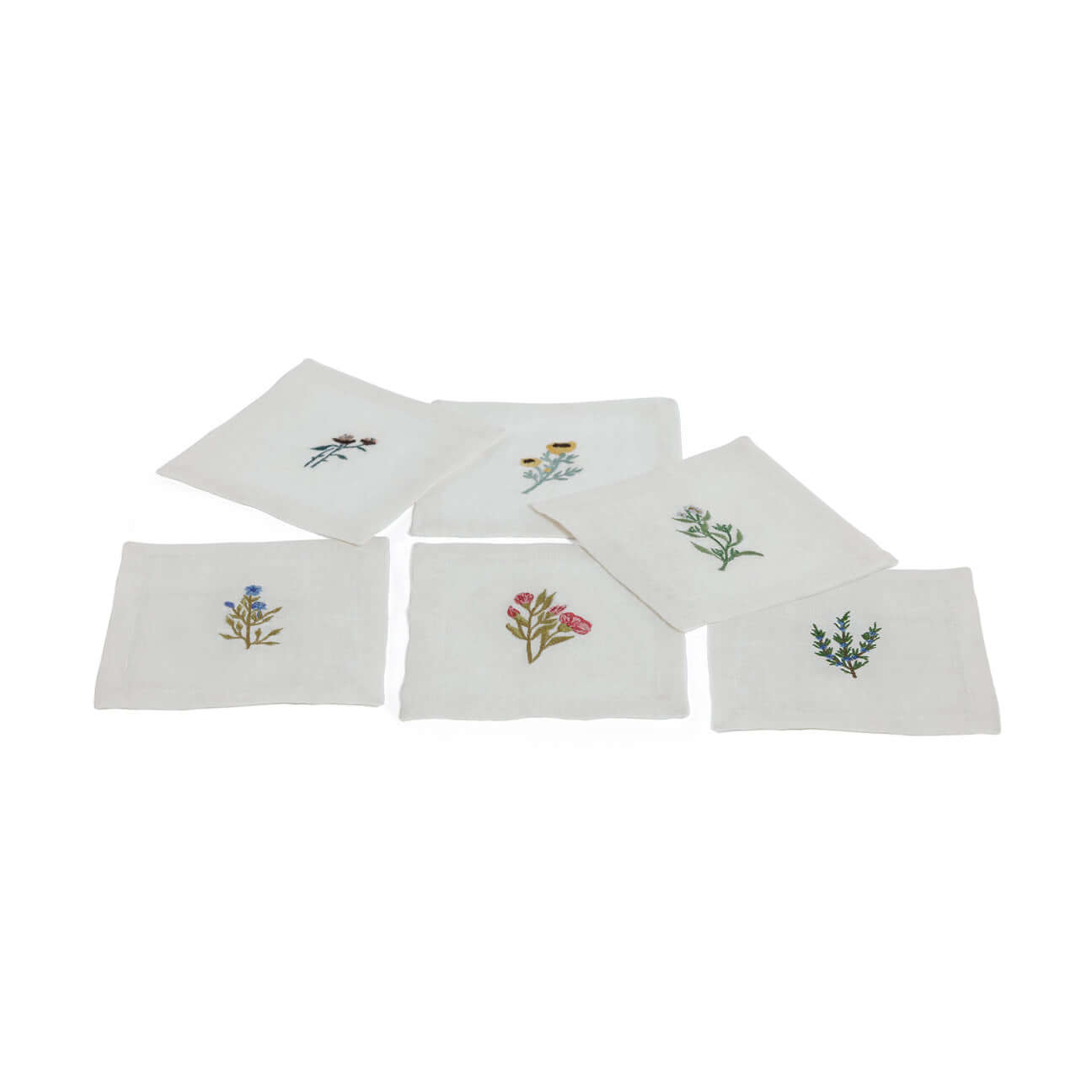Floral Linen Cocktail Napkins - 6 Assorted Designs (Set of 6) featuring delicate floral motifs on white linen.