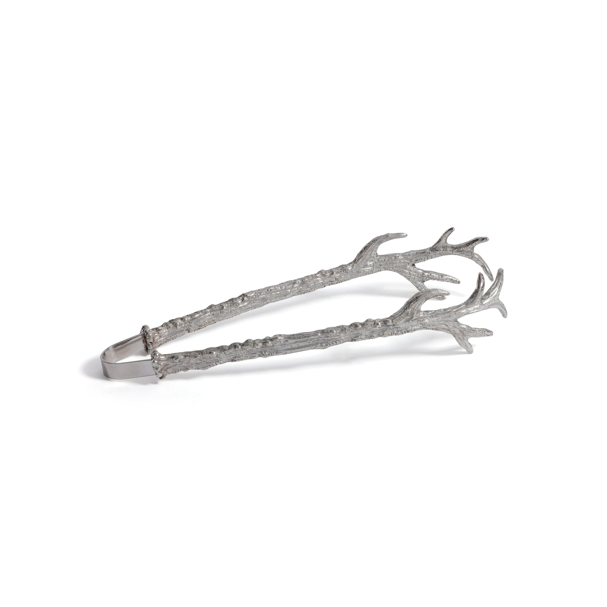 Silver tongs with antler design on a white background