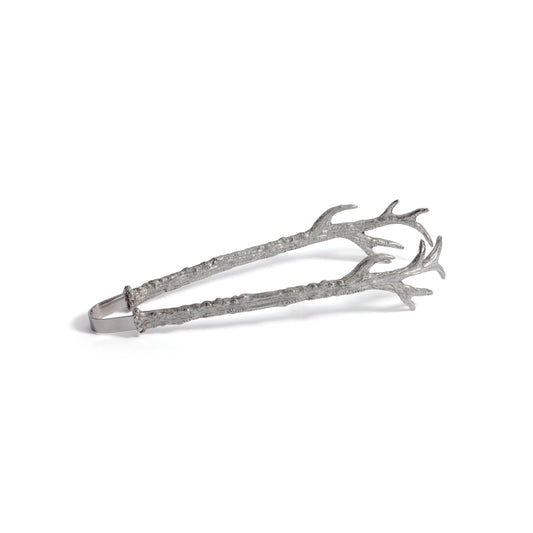 Silver tongs with antler design on a white background