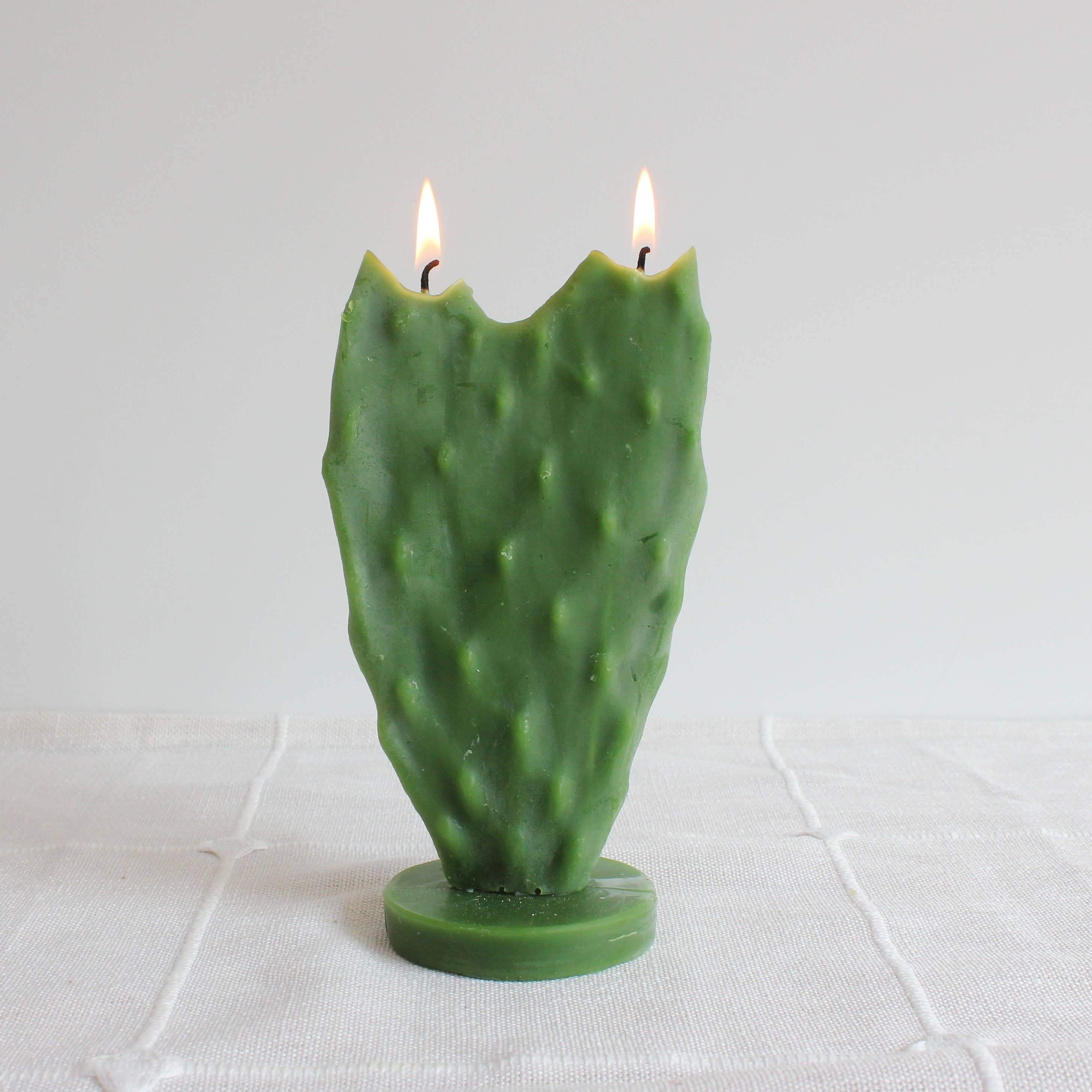 Nopal Cactus Beeswax Candle, handcrafted, eco-friendly, unscented, burning elegance, decorative home decor.