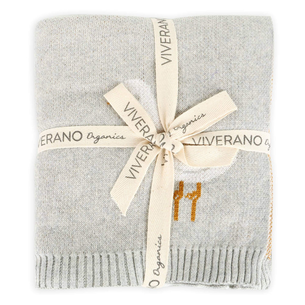 Duck Waddle - Organic Jacquard Knit Baby Blankets wrapped in a ribbon, showcasing soft, gender-neutral design.