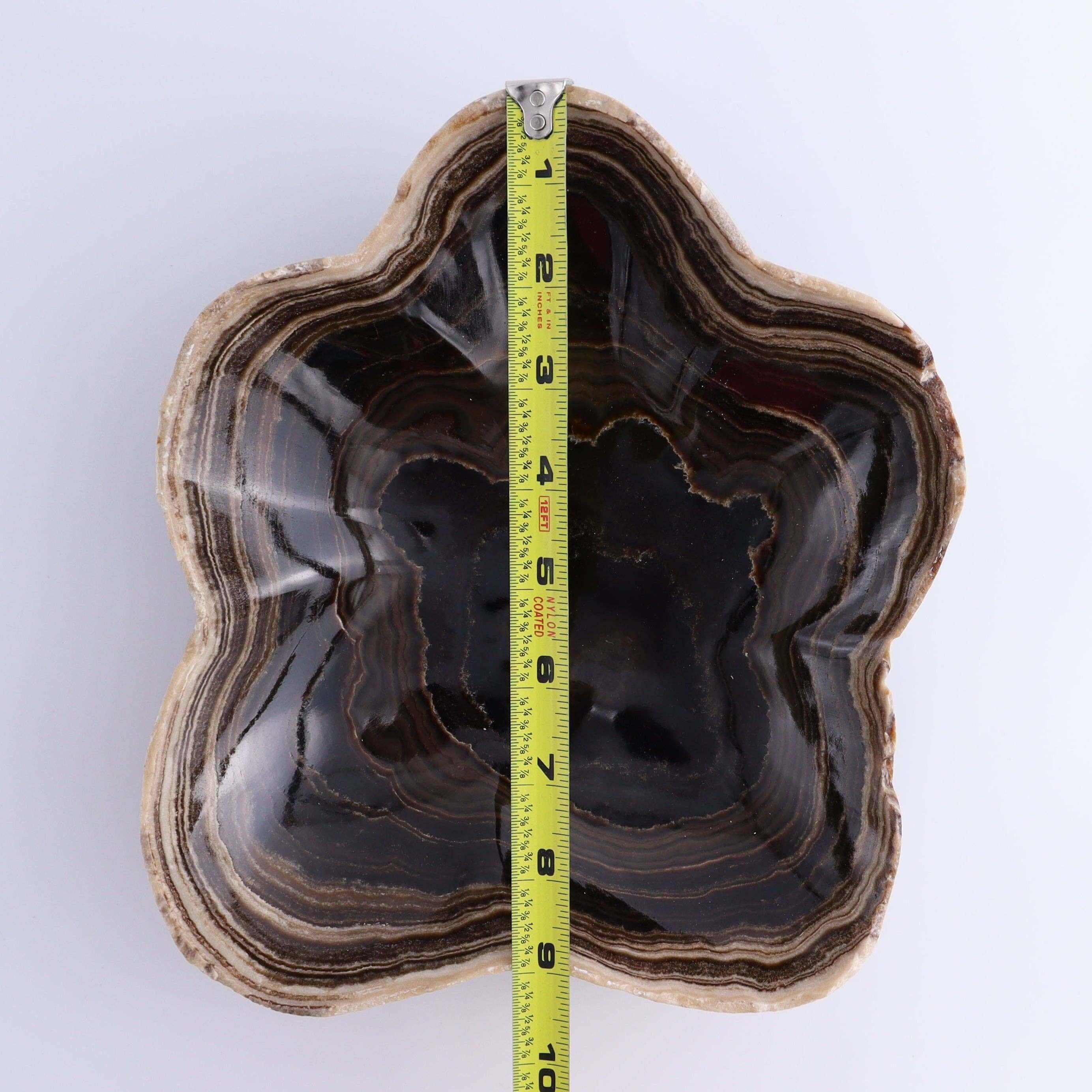 Mexican Onyx/Calcite Chocolate BOWL OOAK displayed with measurement tape for size reference.
